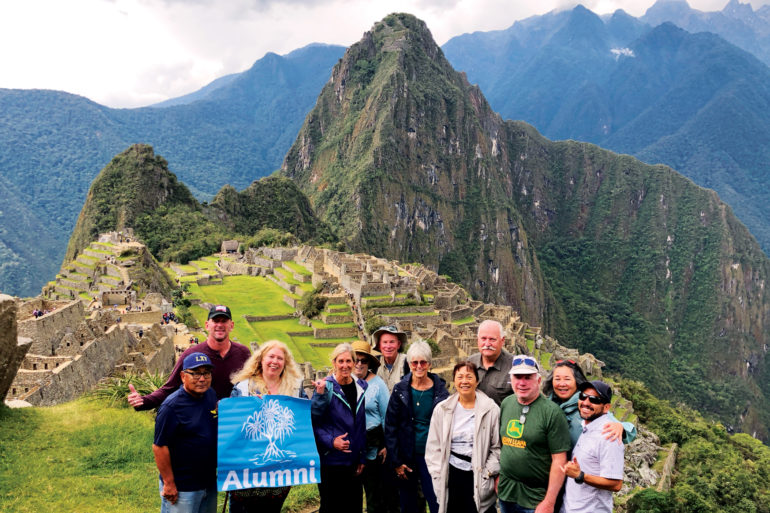 Clouds cleared for a group photograph of Machu Picchu, the Lost City of the Incas. Travelers marveled at the city’s dry-stone walls, an architectural feat nestled on high-altitude mountain peaks.