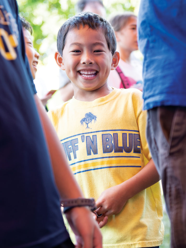 First-grader Kai Ishihara ’30 flashes a winning smile at Carnival.